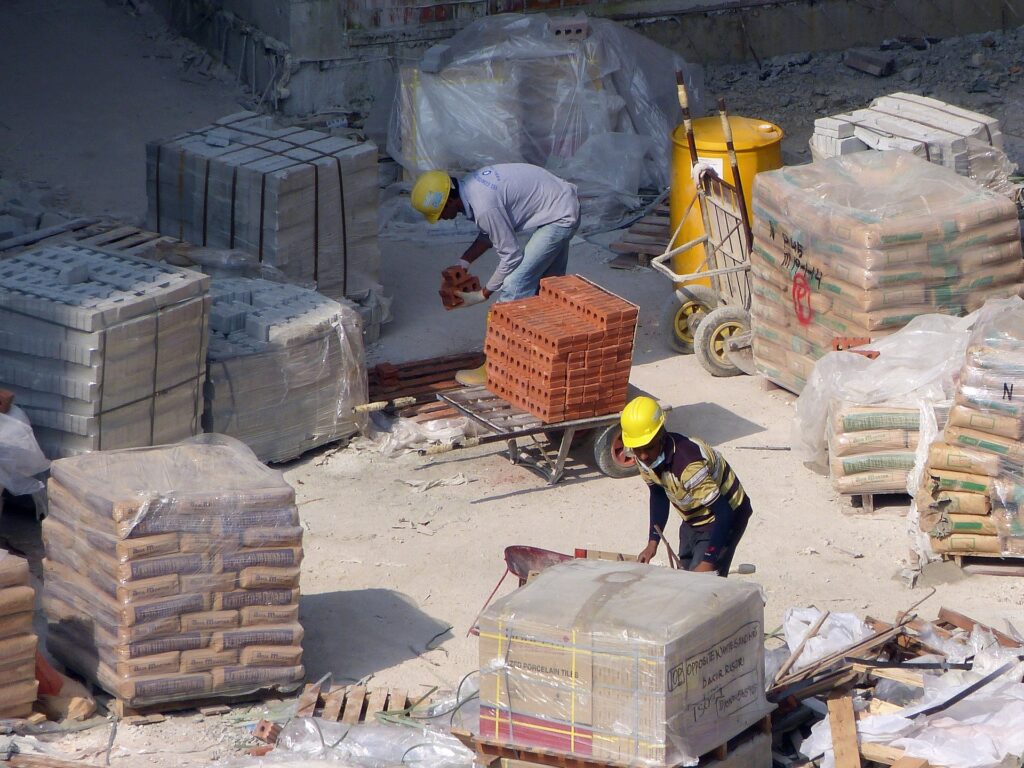 Cement bags and bricks on a construction site