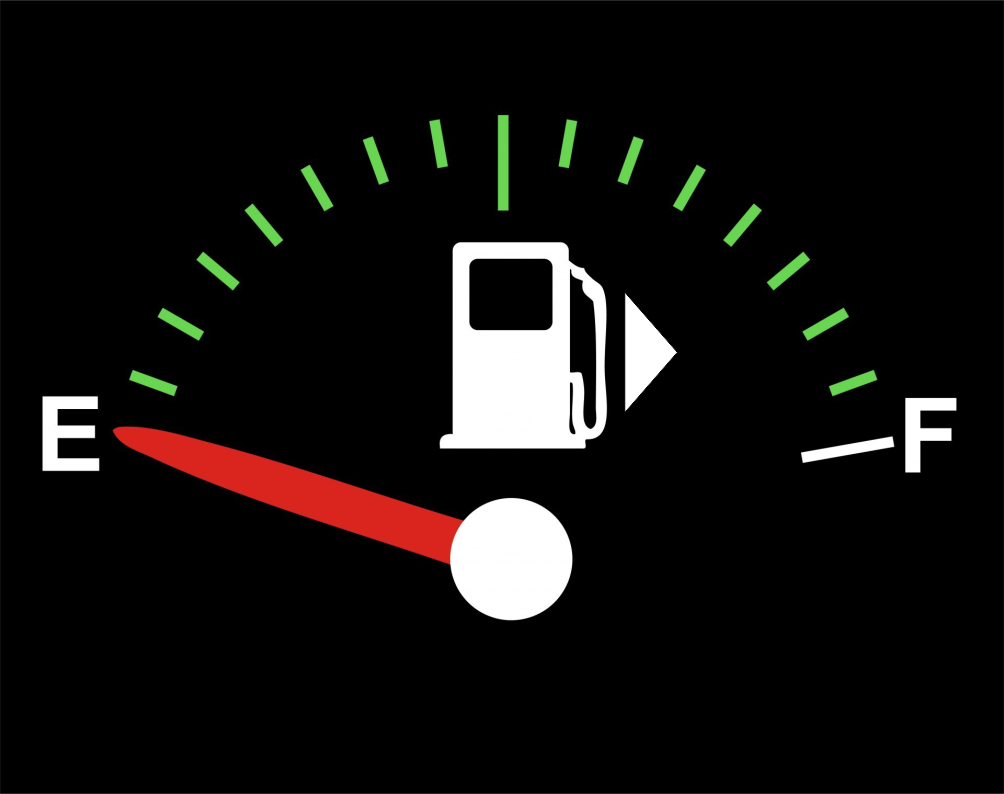 Arrow in Fuel Gauge shows the fuel cap is located on the right side of the vehicle.